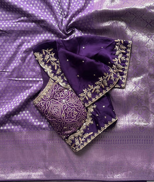 Banarasi Silk Saree Teamed With Red Bandhej Stiched Blouse